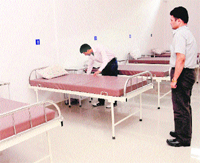 A ward attendant arranges things at the newly opened drug de-addiction centre at Sector 18 in Chandigarh on Wednesday.