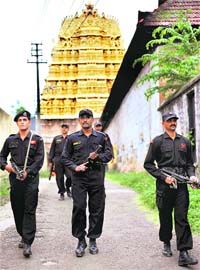 Commandos on patrol duty at Sree Padmanabha Temple, Thiruvananthapuram, Kerala, as the SC issued gag orders against going public on ownership and value of assets