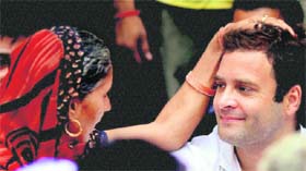 AICC General Secretary Rahul Gandhi is blessed by an old woman in Alawalpur on Wednesday