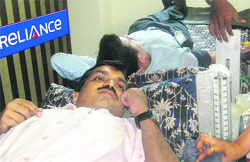 A man donates blood at a camp organised by the Blood Bank Society of Government Multi Speciality Hospital, Sector 16, at the DLF, IT Park, on Thursday