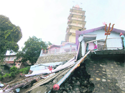 A view of the collapsed part of the Nau Manzila temple in Mussoorie.