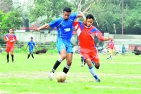 Players in action in the Nemi Dass Memorial District Football League in Dehradun on Thursday