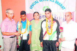 Special athletes from Himachal Pradesh with Dr Mallika Nadda and others at Bilaspur on Thursday. 