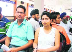 Endless wait Sheenam, along with her father Vijay Batta, waits for her turn to submit her documents for a drivers licence at a suvidha centre in Ludhiana