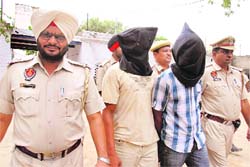 In the net Two members of a gang of carjackers in police custody in Ludhiana 