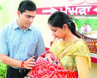 Deputy Commissioner Rajat Agarwal and his wife Ritu Agarwal hold the 2-day-old abandoned baby, who was left at Red Cross Bhavan in Amritsar 