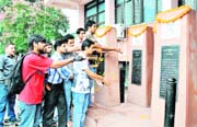 Activists of the ABVP pay tributes to martyrs on the partys founders day at DAV College, Sector 10, Chandigarh, on Friday. 