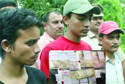 The servants in police custody. 