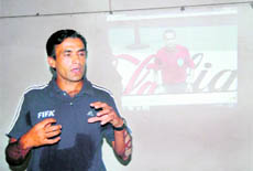 Pratap Patwal, FIFA referee, gives tips to players at an awareness camp held  in Dehradun 