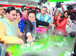 Chief Minister Ramesh Pokhriyal Nishank at a stall at a health exhibition in Dehradun 