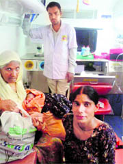 The newborn in the lap of his grandmother after Harpreet Kaur delivered the child in Ambulabnce 108 while being taken a hospital in Ludhiana on Friday.