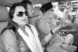 MPs Jaya Prada and Amar Singh before their arrest at Sambhal in Uttar Pradesh on Friday. They were on their way to Asatalpur where the police and villagers clashed two days ago. 