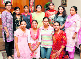 The Gopi Chand Arya Mahila College team that has won the best duty award at a PU mountaineering camp.