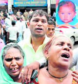 Family members of three-year-old Vikas (inset) grieve after he died at a nursing home in Sector 20, Chandigarh, on Saturday.