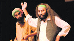 A scene from the play Arbad Narbad Dhundukara at the Tagore Theatre in Chandigarh on Saturday. 