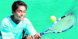 Hardeep plays a shot during the CLTA-AITA National Series Tennis Tournament in Chandigarh on Saturday.