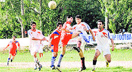 A match in the Lala Nemi Dass Memorial District Football League underway in Dehradun on Saturday.