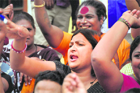 Mr Azad, are you listening? Sex workers and eunuchs raise slogans to protest against Union Minister Ghulam Nabi Azads remark on gay sex, in Bangalore on Saturday.