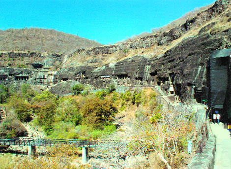 The 30 Ajanta caves, carved into a horse-shoe shaped cliff, were designed as monasteries and prayer halls for Buddhist monks