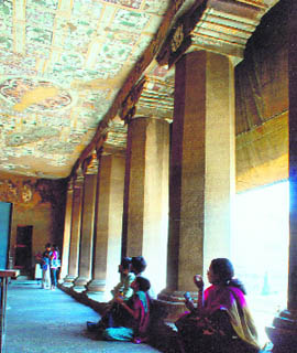 Brightly painted floral designs are a repetitive theme on the ceilings of the verandahs Photos by the writers