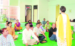 Shweta Golani, instructor from the Art of Living, addresses the participants at a workshop at Unison World School in Dehradun on Sunday. 