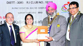 (From left) Newly installed secretary of the Rotary Club, Dehradun centre, Ashok Ahuja along with Poonam Singh, Rotary District Club Governor Manpreet Singh and newly elected president of the Rotary Club, Dehradun centre, Kailash Gulati, at a function in Dehradun on Saturday.