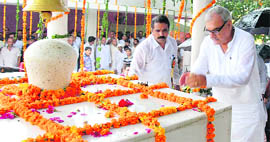 Chief Minister Bhupinder Singh Hooda pays obeisance at Dada Bhaiya shrine in Rathdhana village of Sonepat district on Sunday.