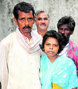 Pinki with her father, Saten Mukhiya, in Karnal.