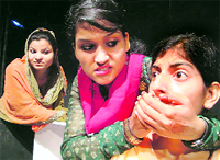 A scene from an Urdu play, "Intzaar ka Doosra Rukh", which was performed at the Natrang Studio in Jammu on Sunday