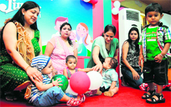 Kids with their mothers during a baby show at Mothers Pride Pre School in Ludhiana on Sunday