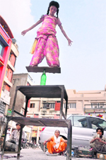 Neha performs a stunt at Bhadaur House in Ludhiana