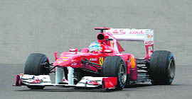 Alonso drives at the Silverstone circuit during the Formula One Grand Prix on Sunday.