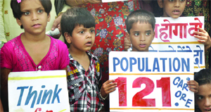 Children under the banner of Surbhi Parivar, an NGO,  demand Population Control Bill for two children per couple, in New Delhi 