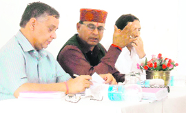 State Youth Welfare and Sports Minister Khajan Dass (centre) addresses the executive committee meeting of the Youth Welfare Board in Mussoorie on Monday.