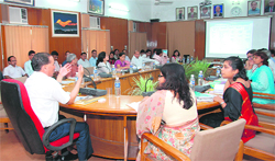 Chief Secretary Subhash Kumar at a meeting with education officials in Dehradun on Monday.