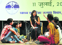 Artistes perform at a function on the occasion of the World Population Day at the Gaiety Theatre in Shimla on Monday.