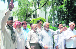 Members of the Tanzim-e-Rehnumae Millet hold a protest in Dehradun on Tuesday