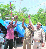 Rajaji Park officials remove encroachments on the way to the Mata Mansa Devi shrine in Haridwar on Tuesday.