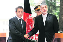 Afghan President Hamid Karzai with his French counterpart Nicolas Sarkozy in Kabul on Tuesday. 