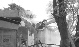 An anti-encroachment drive in progress on the railway road in Ambala Contonment. 