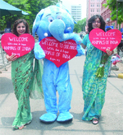'Bholu' the elephant is among those holding placards to welcome the new environment and forest minister Jayanti Natarajan during a demonstration near Paryavaran Bhawan. An amendment to the Prevention of Cruelty to Animals Act 1960 was also sought in New Delhi on Wednesday.