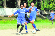 A match in progress in the Lala Nemi Dass Memorial District Football League in Dehradun on Wednesday. 