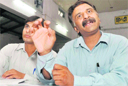 Brijmohan Sharma of the Society of Pollution and Environmental Conservation Scientists addresses a press conference in Dehradun on Wednesday