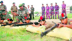 NCC cadets learn shooting during a training camp in Amritsar on Wednesday