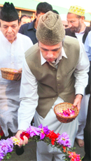 Chief Minister Omar Abdullah lays a wreath at the Martyrs Graveyard in Srinagar on Wednesday