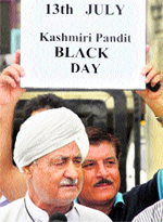 Members of the All-State Kashmiri Pandits Conference and the SDY Sabha, Shitalnath, stage a protest in Jammu on Wednesday
