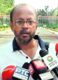 Dr. Sajib Kumar Nandi speaks to the media outside NIS, Patiala after being refused entry