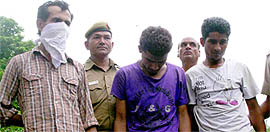 Three persons arrested in connection with an attempted armed robbery at Muthoot Fincorp at Nathu Colony Chowk in east Delhi in New Delhi on Thursday.