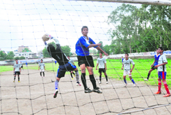 The goalkeeper saves a goal in a match in the Lala Nemi Dass Memorial District Football League in Dehradun on Thursday