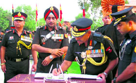 Lt Gen SK Singh, GOC-in-C South Western Command, signs the visitors book of the DOT War Memorial in Hisar.